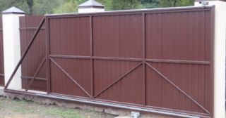 Купить откатные ворота из профнастила Сибай, цена от 1780 руб.